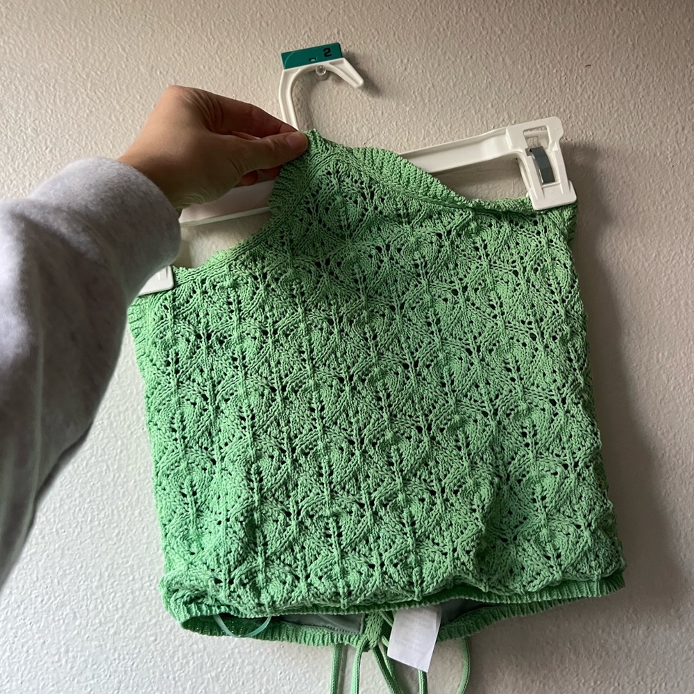 Green knit halter top. Super cute. Worn a couple times!